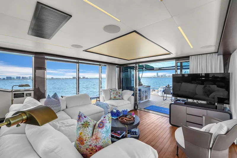  Yacht Photos Pics Luxurious interior of 2021 OKEAN 80 yacht with ocean view, modern decor, and comfortable seating.
