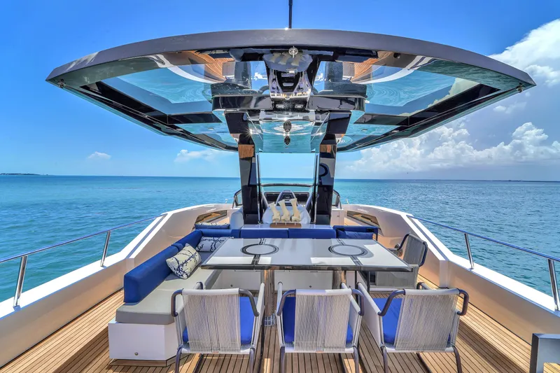 Yacht Photos Pics Luxurious 2021 OKEAN 80 yacht with elegant deck seating and ocean view.