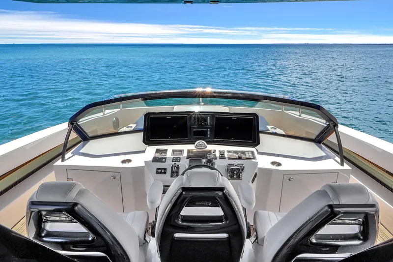  Yacht Photos Pics Cockpit view of 2021 OKEAN 80 yacht with ocean backdrop.