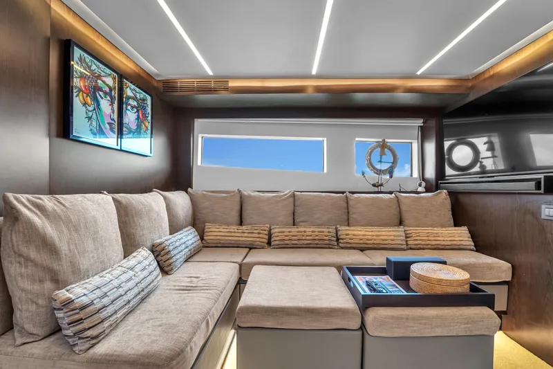  Yacht Photos Pics Luxurious interior of 2021 OKEAN 80 yacht with modern seating and vibrant artwork.