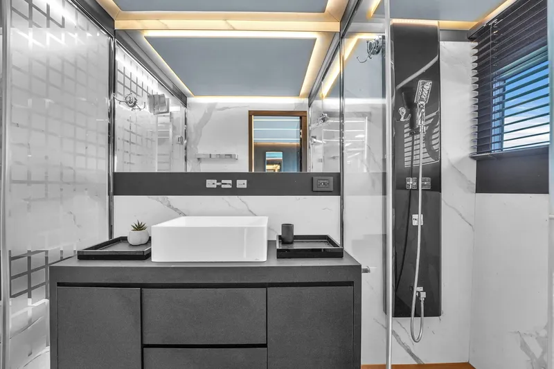  Yacht Photos Pics Modern bathroom interior on OKEAN 80 yacht, featuring sleek design and elegant fixtures, 2021 model.
