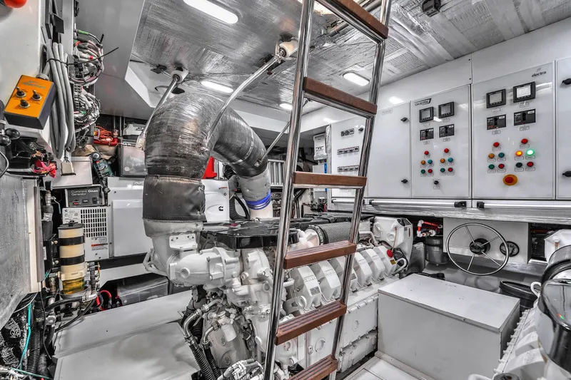  Yacht Photos Pics Engine room of 2021 OKEAN 80 yacht with control panels and machinery.