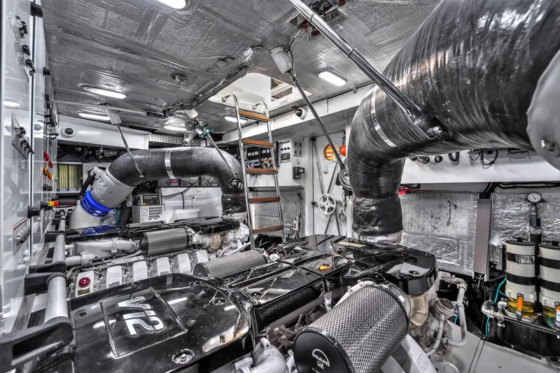  Yacht Photos Pics Engine room of 2021 OKEAN 80 yacht, featuring advanced machinery and sleek design.