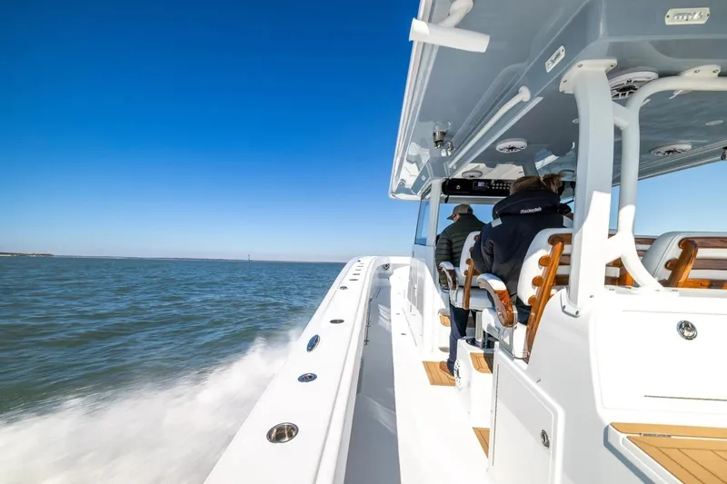 Best Medicine II Yacht Photos Pics 2022 Freeman 47 boat cruising on open water under clear blue sky.