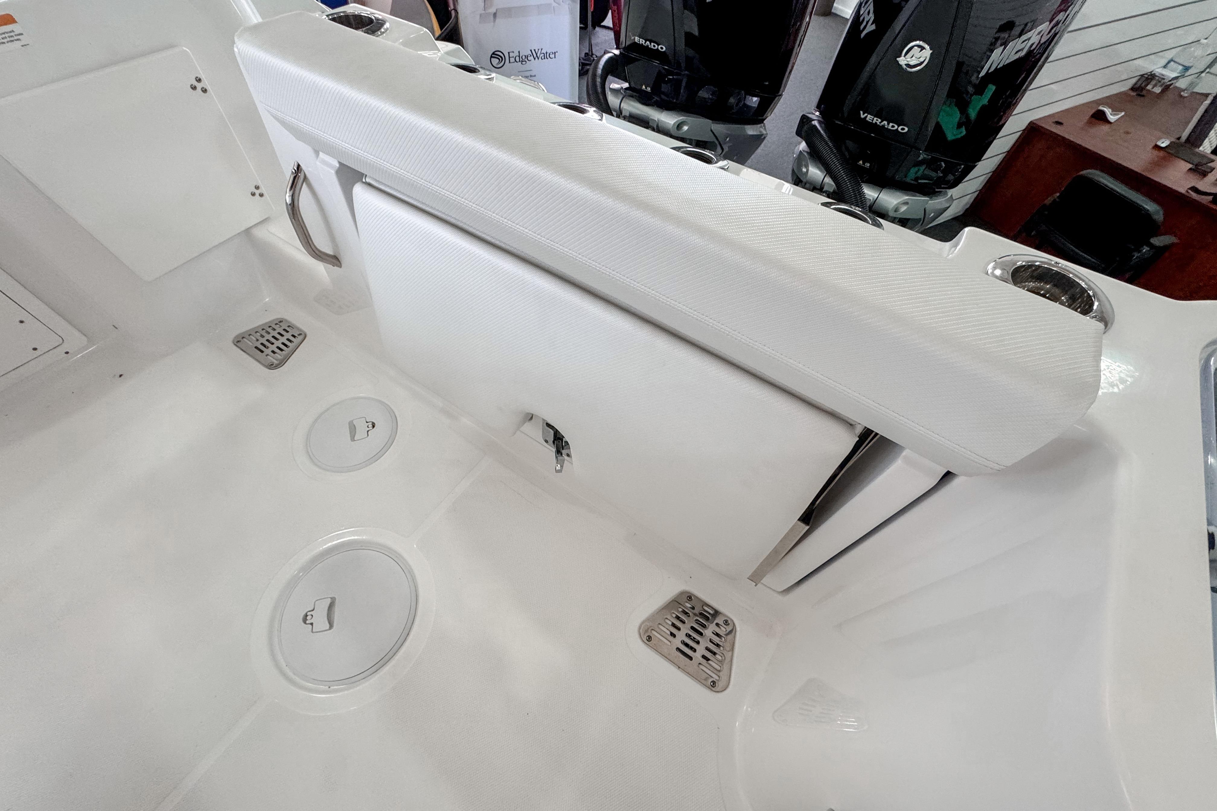 2024 Wellcraft 263 Fisherman boat interior with seating and storage compartments.