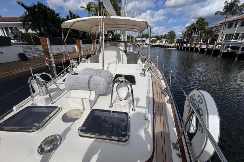 Entertainer Yacht Photos Pics 1989 Little Harbor Sloop 58' docked, showcasing deck and cockpit under sunny skies.