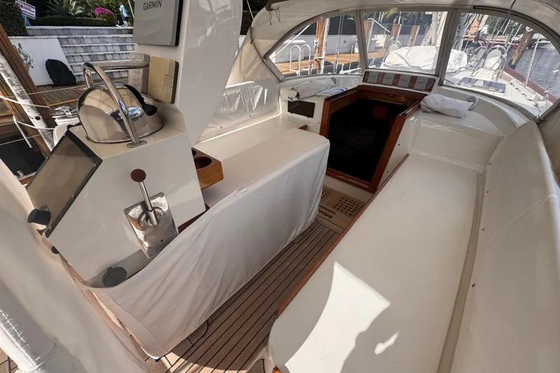 Entertainer Yacht Photos Pics 1989 Little Harbor Sloop 58' cockpit with helm, seating, and navigation equipment.