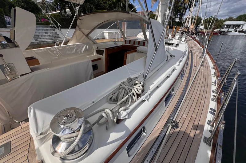 Entertainer Yacht Photos Pics 1989 Little Harbor Sloop 58' with teak deck and polished fittings docked.