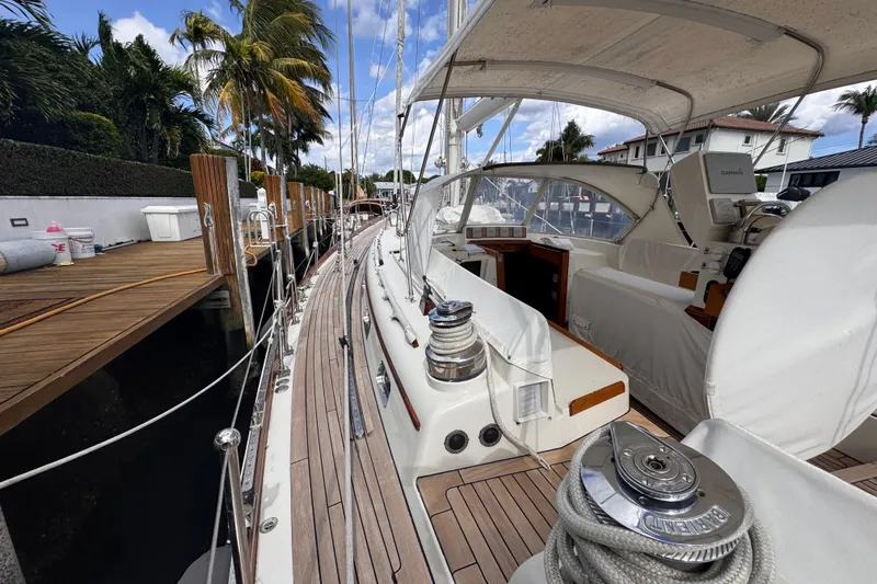 Entertainer Yacht Photos Pics 1989 Little Harbor Sloop 58' docked, showcasing deck and cockpit under sunny skies.
