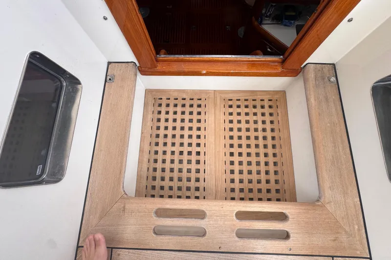 Entertainer Yacht Photos Pics Wooden hatch entrance on 1989 Little Harbor Sloop 58' sailboat.