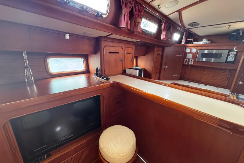 Entertainer Yacht Photos Pics Interior of 1989 Little Harbor Sloop 58' with wood finish and modern amenities.