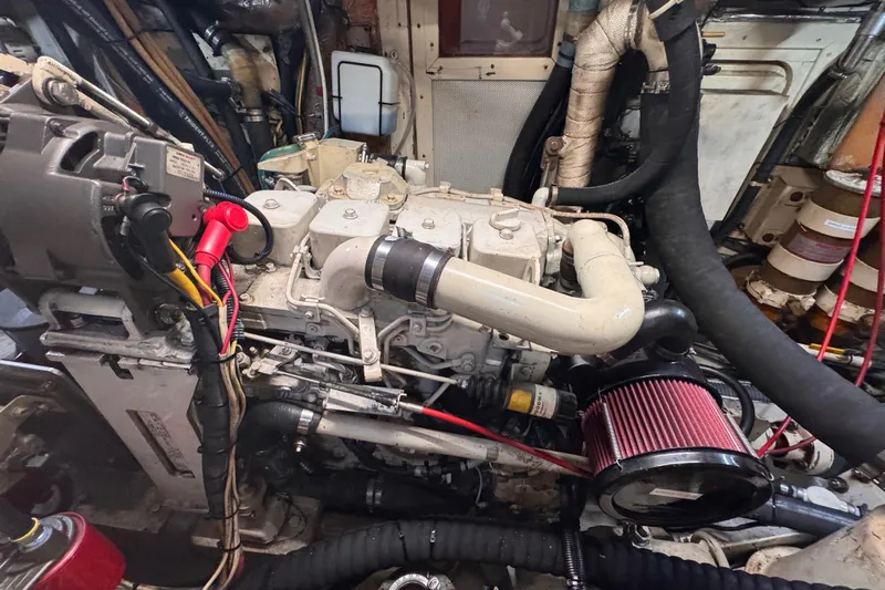 Entertainer Yacht Photos Pics Engine room of a 1989 Little Harbor Sloop 58' with visible components and wiring.