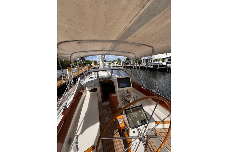 Entertainer Yacht Photos Pics 1989 Little Harbor Sloop 58' yacht cockpit with steering wheel and navigation equipment.