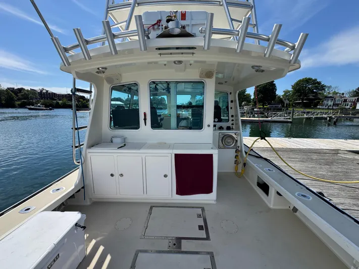 Chilla Yacht Photos Pics 2009 Northern Bay 36 boat docked, featuring spacious deck and cabin area.