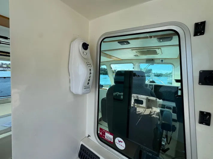 Chilla Yacht Photos Pics Interior view of a 2009 Northern Bay 36 boat with EPIRB device.