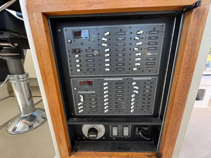 Chilla Yacht Photos Pics Electrical control panel on a 2009 Northern Bay 36 boat, featuring various switches and gauges.