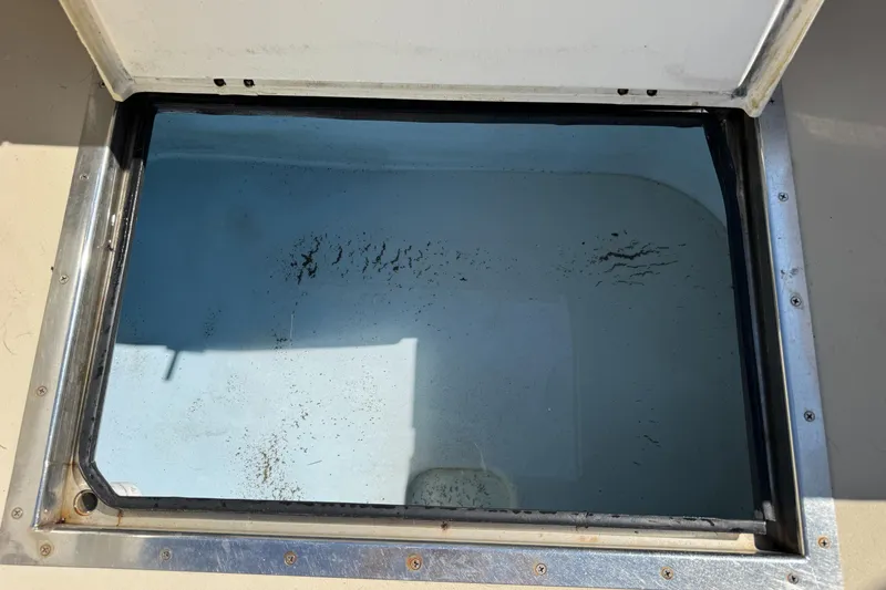 Chilla Yacht Photos Pics Open hatch on 2009 Northern Bay 36 boat, showing interior compartment.