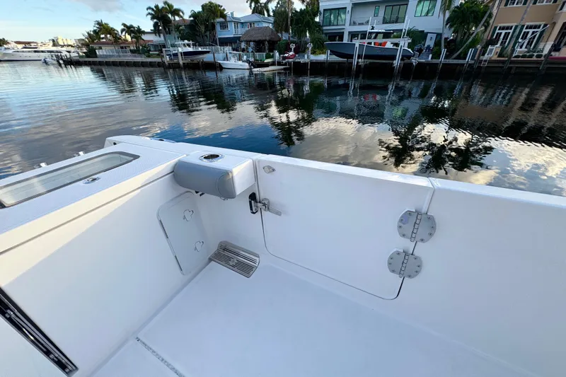  Yacht Photos Pics 2021 Everglades 335 Center Console boat interior with waterfront view.