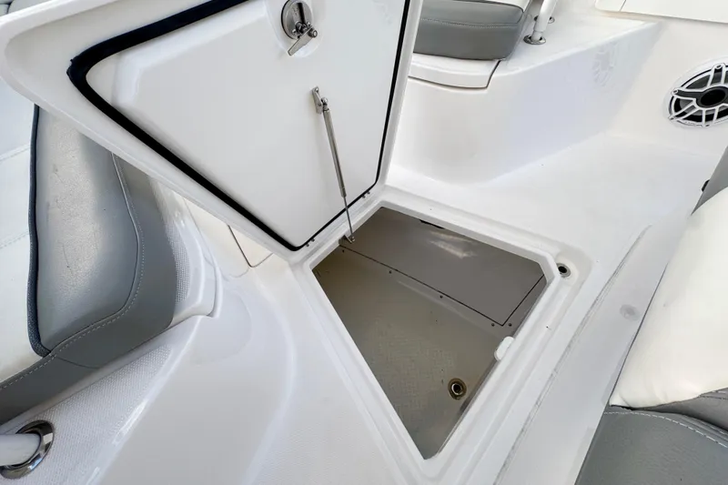  Yacht Photos Pics Open storage compartment on 2021 Everglades 335 Center Console boat interior.