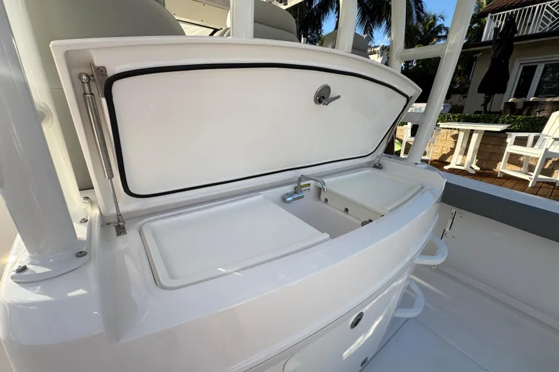  Yacht Photos Pics 2021 Everglades 335 Center Console boat sink and storage area.