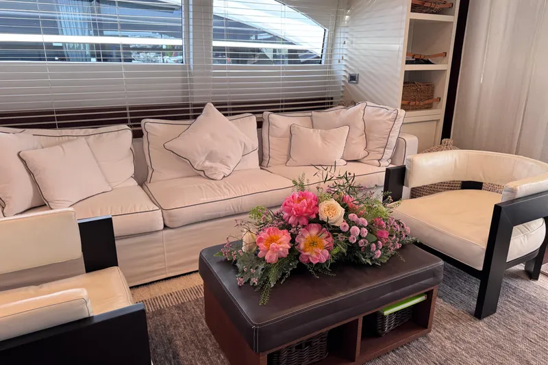  Yacht Photos Pics Luxurious Canados 86 yacht interior with elegant seating and floral centerpiece, 2009 model.