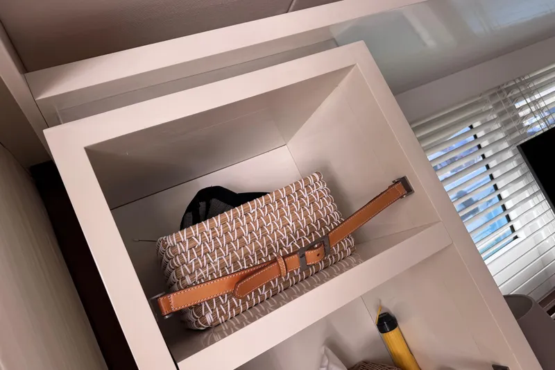  Yacht Photos Pics Woven handbag on shelf inside 2009 Canados 86 yacht interior.