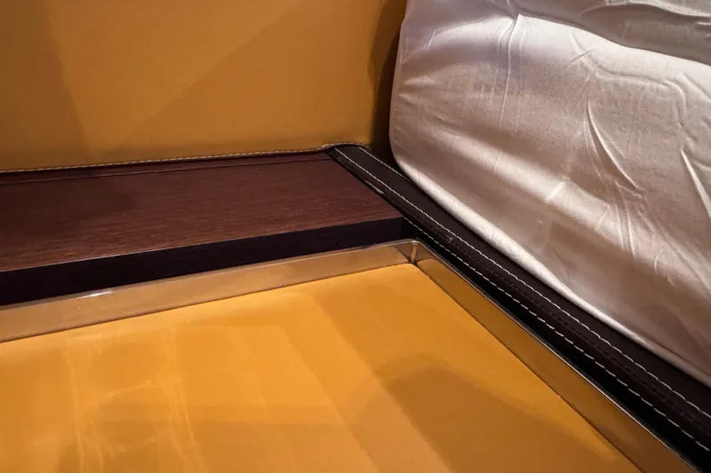  Yacht Photos Pics Interior detail of 2009 Canados 86 yacht, featuring luxurious wood and leather elements.