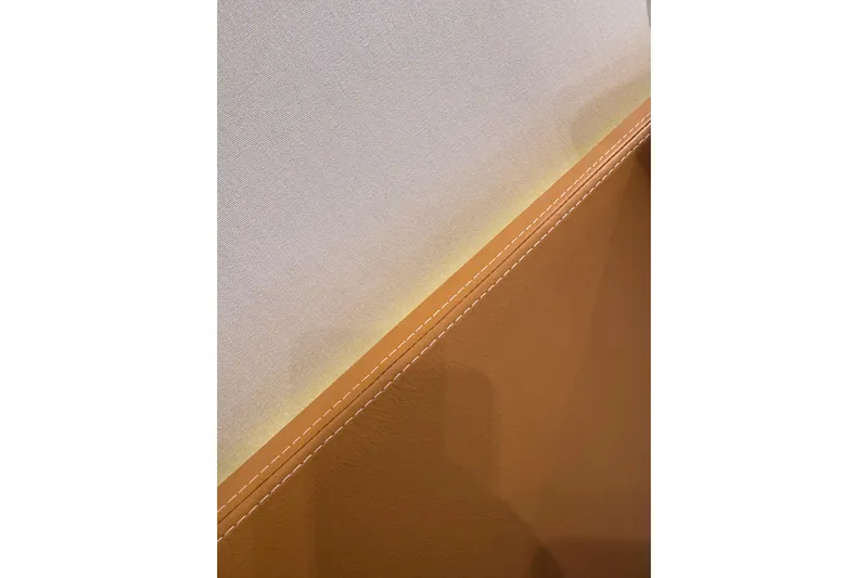  Yacht Photos Pics Close-up of Canados 86 yacht interior detail, showcasing elegant stitching, 2009 model.