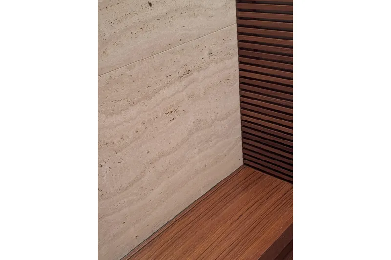  Yacht Photos Pics Interior detail of 2009 Canados 86 yacht, featuring wood and stone textures.