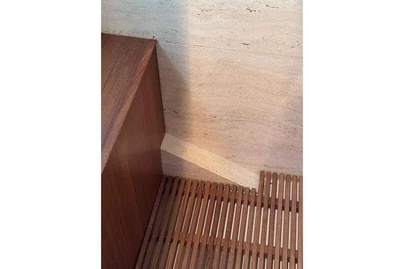  Yacht Photos Pics Wooden interior detail of 2009 Canados 86 yacht, featuring slatted flooring and wall paneling.