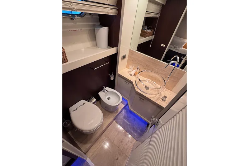  Yacht Photos Pics Luxurious bathroom on 2009 Canados 86 yacht with modern fixtures and elegant design.