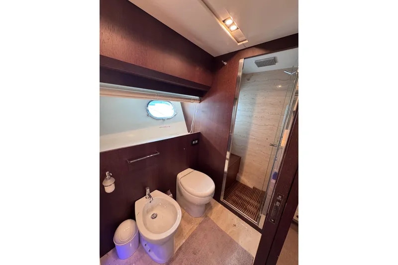  Yacht Photos Pics Luxurious bathroom on 2009 Canados 86 yacht with modern fixtures and shower.
