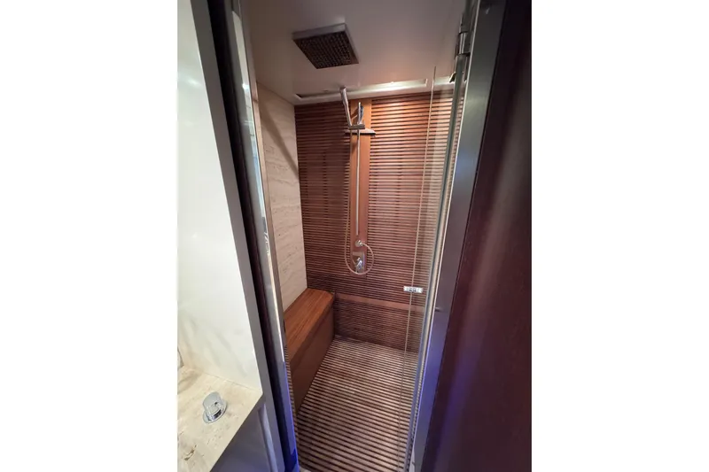  Yacht Photos Pics Luxurious wooden shower interior on 2009 Canados 86 yacht.