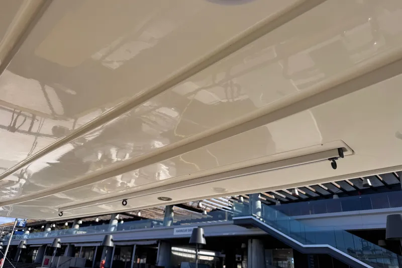  Yacht Photos Pics Close-up of a 2009 Canados 86 yacht's sleek exterior design and structure.