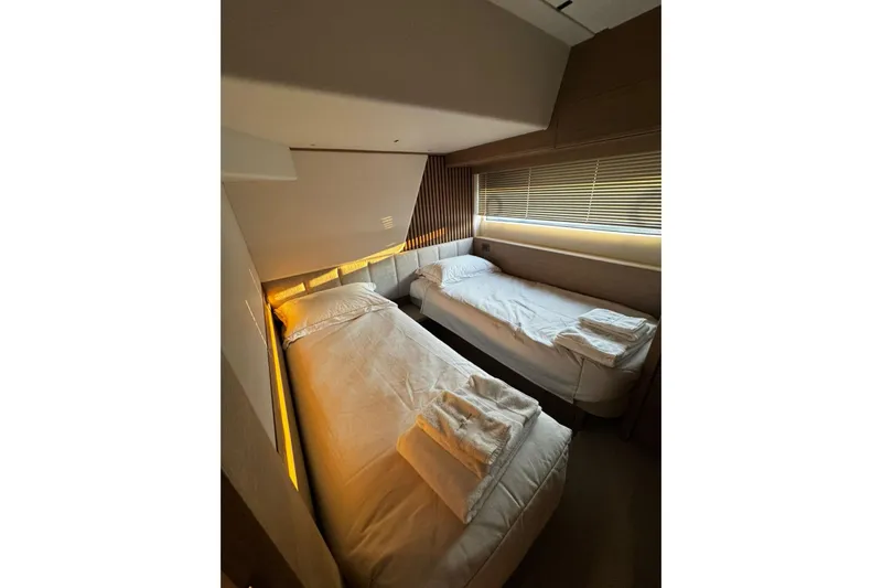 Solomon Yacht Photos Pics Luxurious twin cabin in 2025 Princess Y72 yacht, featuring modern design and ambient lighting.