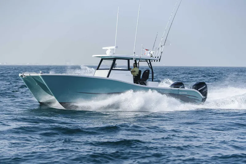  Yacht Photos Pics 2026 SilverCAT 34CC boat cruising on open water, showcasing sleek design and powerful engines.