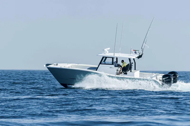  Yacht Photos Pics 2026 SilverCAT 34CC boat cruising on open water, showcasing sleek design and performance.