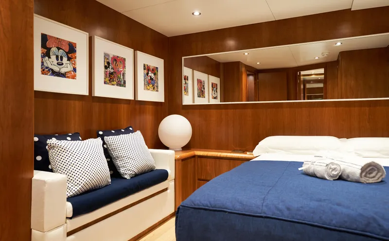 L'instant IV Yacht Photos Pics Luxurious cabin interior of 2009 Castagnola Navetta 33 yacht with modern decor.