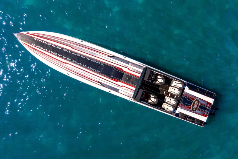  Yacht Photos Pics Aerial view of 2020 Cigarette 515 racing boat on clear blue water.