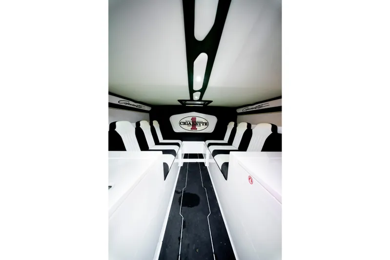  Yacht Photos Pics Interior of 2020 Cigarette 515 boat, featuring sleek white and black seating design.