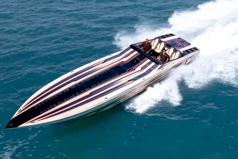  Yacht Photos Pics 2020 Cigarette 515 speedboat cruising on open water, showcasing sleek design and performance.