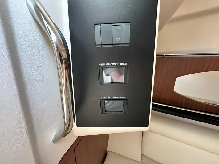  Yacht Photos Pics 2024 Grady-White Freedom 335 air conditioning controls in cabin interior.