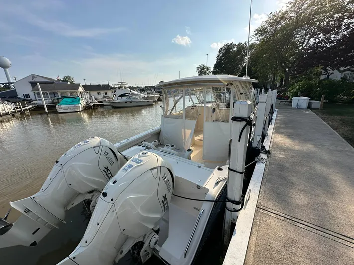  Yacht Photos Pics 2024 Grady-White Freedom 335 boat docked with dual Yamaha outboard engines.