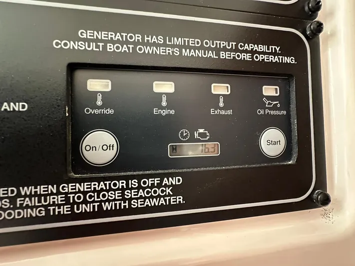  Yacht Photos Pics Control panel of 2024 Grady-White Freedom 335 boat generator with limited output capability warning.