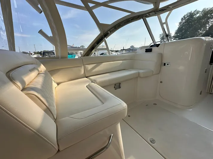  Yacht Photos Pics 2024 Grady-White Freedom 335 boat interior with luxurious seating and sleek design.