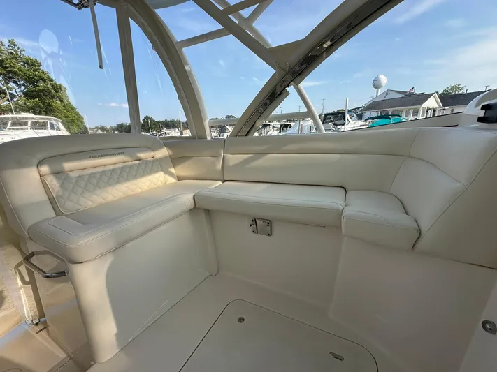  Yacht Photos Pics 2024 Grady-White Freedom 335 boat interior with luxurious seating and panoramic windows.