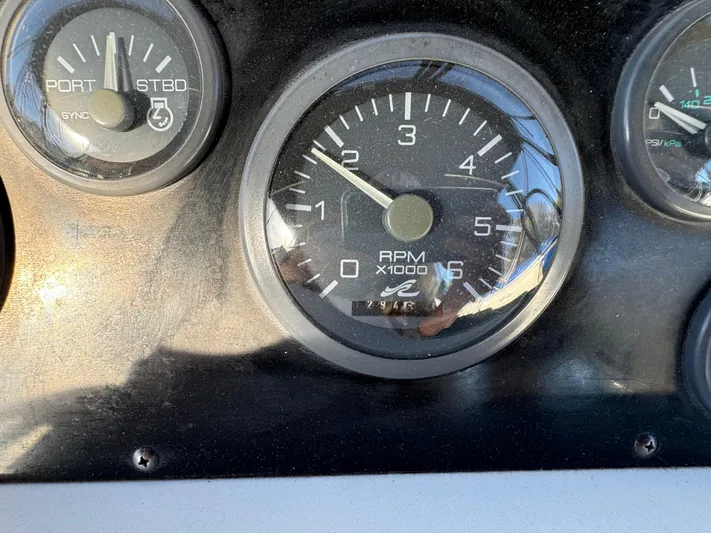 Lady Slipper Yacht Photos Pics Tachometer of 1996 Sea Ray 400 Sedan Bridge showing RPM readings.