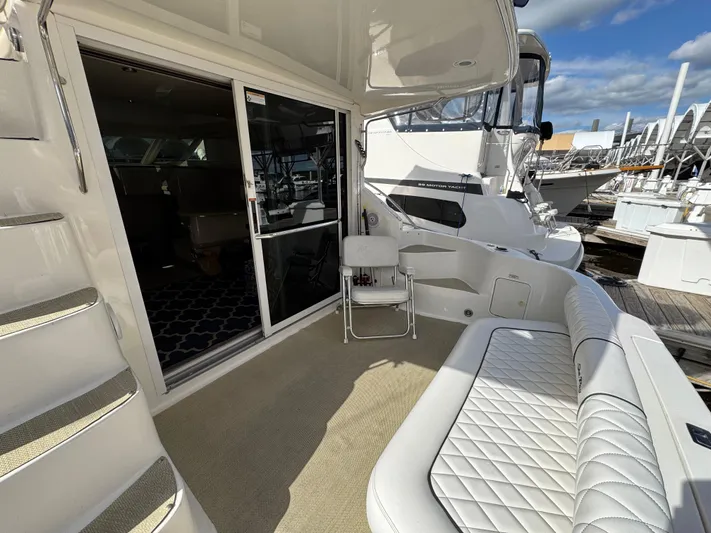 Lady Slipper Yacht Photos Pics 1996 Sea Ray 400 Sedan Bridge yacht with spacious deck and comfortable seating.