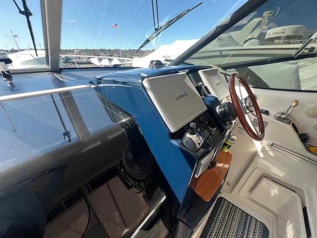  Yacht Photos Pics 2007 Tiara Yachts 3900 Sovran helm with Garmin navigation system and wooden steering wheel.