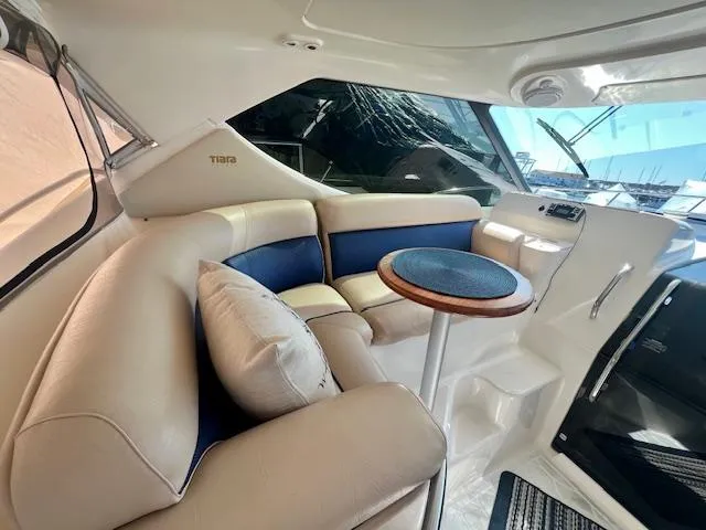  Yacht Photos Pics Luxurious interior of 2007 Tiara Yachts 3900 Sovran with plush seating and elegant table.